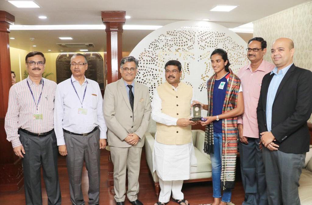 Honorable Union Steel Minister Shri Dharmendra Pradhan felicitates PV Sindhu, suggests her to lend voice to national missions